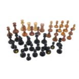 Assorted chess pieces, to include many weighted examples in the Jacques Staunton style; one