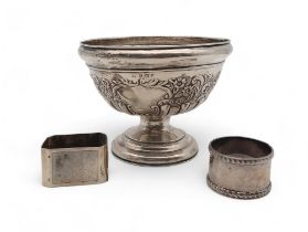 An Edwardian silver sugar bowl, Birmingham 1905, with scrolling foliate decoration, and two silver