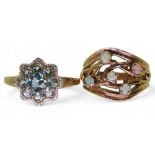 A 9ct gold opal ring, size Q, a blue topaz and diamond flower ring, size S1/2, weight together 6.