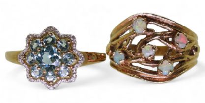 A 9ct gold opal ring, size Q, a blue topaz and diamond flower ring, size S1/2, weight together 6.