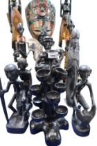 A collection of African painted wooden figures, horses etc (12) Condition Report:Available upon