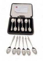 A cased set of silver spoons, by Cooper Brother & Sons, Sheffield, and another loose set, 167gms (2)