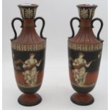 A pair of Mettlach ceramic twin handled urns decorated Condition Report:Available upon request