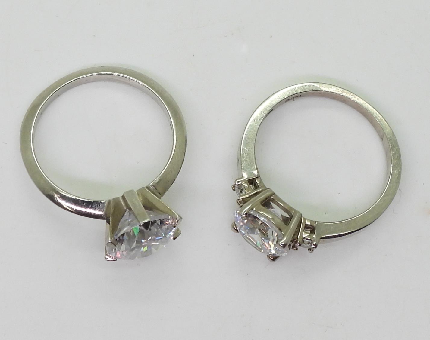 Two white metal mounted 'Tru Diamonds' diamond simulant rings, a solitaire size M1/2, ans a three - Image 2 of 3