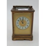 A French brass and glass carriage clock Condition Report:Available upon request
