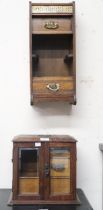 A lot comprising Victorian oak smokers cabinet with pair of glazed doors concealing two short over