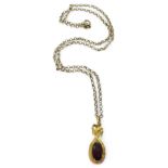 A bright yellow metal garnet pendant, weight 2.2gms, together with a 46cm belcher chain, weight 3.