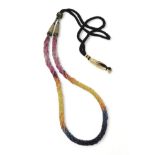 Rainbow sapphire beads each faceted bead is strung in a multi string twisted necklace with