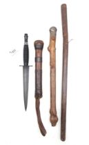 A Fairbairn Sykes Third Pattern fighting knife, with black grip; together with a weighted cosh,