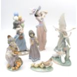 A collection of Lladro and Nao figures of girls and birds including a Sad Clown head, all with boxes