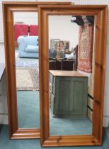 A pair of contemporary pine framed wall mirrors, 137cm x 62cm (2) Condition Report:Available upon