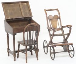A lot comprising an early 20th century oak Tri-Ang toy's child's writing desk, a beech child's