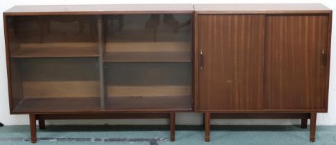 A lot comprising two Beaver & Tapley Ltd "multi-width" bookcases, the first of which has pair of