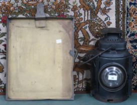 A lot comprising 20th century L.M.S railway lantern and an Anderson's, Elgin patent photo