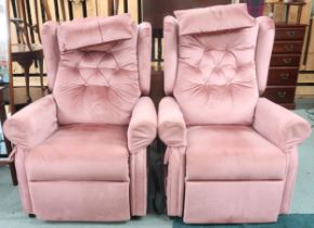 A pair of contemporary Grosvenor mobility riser electrical reclining armchairs with pink velour