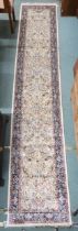 An ivory ground full pile cashmere runner with floral/foliate allover tree of life design