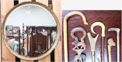A lot comprising a 20th century circular gilt framed bevelled glass wall mirror, 54cm diameter,