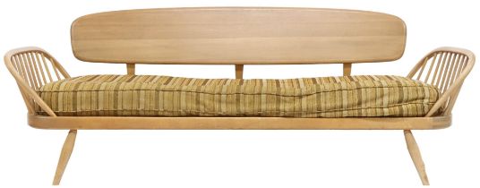 A MID 20TH CENTURY ERCOL BLONDE ELM AND BEECH DAY BED  with removable back rest over upholstered