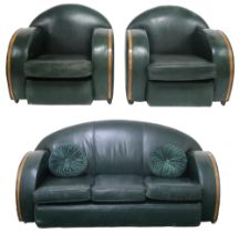 AN EARLY 20TH CENTURY ART DECO HUMPBACKED THREE PIECE SUITE  each with green leather upholstery