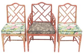 A SET OF THREE 20TH CENTURY AFTER CHIPPENDALE "COCKPEN" FAUX BAMBOO CHAIRS comprising armchair