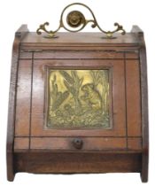 A LATE VICTORIAN OAK ARTS & CRAFTS COAL SCUTTLE  with scrolled brass carry handle over hinged lid