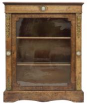 A VICTORIAN WALNUT AND SATINWOOD PIER CABINET  with brass ormolu mounts and ceramic inset plaques