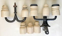 A selection of porcelain Telegraph Insulators to include a pair of LNER flat tops, retaining black