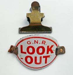 GNR enamel LOOK OUT Armband with leather loops attached but remainder of straps cut off. Together