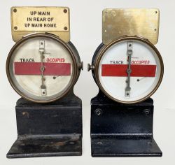 GWR Brass cased Signal Box Track Indicators mounted on cast iron, right angle shelf brackets. One