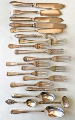 Cutlery selection to include: x10 Forks all marked with various company initials, one ornate LNER