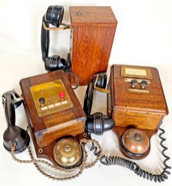 A trio of Signal Box Telephones comprising: Standard type wood cased with bakelite handset on the