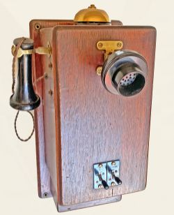 An early and quite substantial wood cased Signal Box Telephone. Measuring 18in x 9.5in, it has the