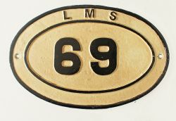 LMS cast iron Bridgeplate number 69. Face may have been restored long ago, rear original.