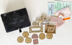 A small BR First Aid Tin containing a BR(M) brass lock; a small quantity of Paychecks including