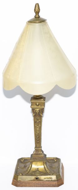 Pullman Type C brass table lamp decorated with Ram's Heads and Greek Urns and stamped on the side of