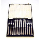 A cased set of twelve silver handled fruit knives and forks