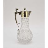 A silver mounted glass claret jug