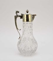 A silver mounted glass claret jug