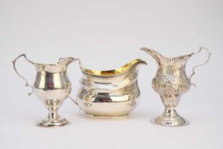 Three silver cream jugs