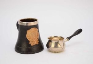 A miniature silver brandy pan and a silver mounted mug