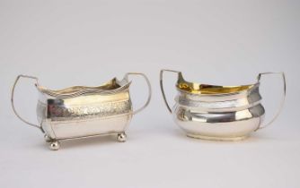 Two silver sugar bowls