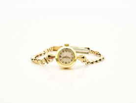 Rolex: A lady's 18ct gold bracelet watch