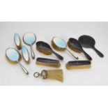 A collection of silver mounted dressing table wares