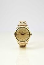 Cyma: A gentleman's gold plated wristwatch