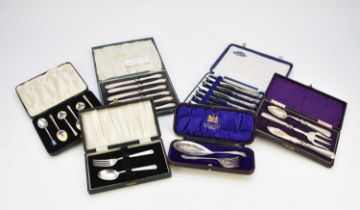 A collection of cased silver cutlery