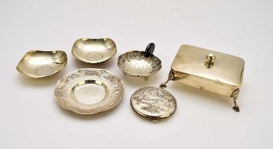 A small collection of white metal