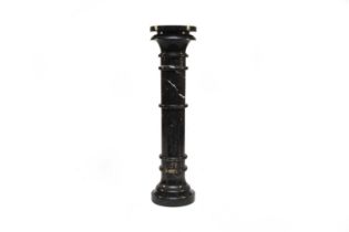 A dark grey veined Sienna marble pedestal or torchère stand