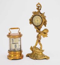 An American gilt metal figural desk clock and an Ever Ready Chronos desk clock