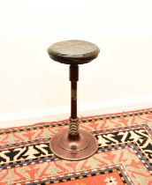 A 20th century cast iron dentist stool