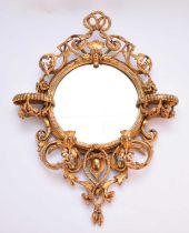 A rococo revival giltwood girandole wall mirror